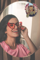 Betty Boop Fridge Magnet Biker Betty is posing while riding a pink bike. This fridge magnet sticks easily to the fridge or any other magnetic surface where magnets can stick to. Betty Boop Biker fridge magnet has a fine quality craftsmanship.Exclusively Available at Reliance Gifts www.reliancegifts.co.uk