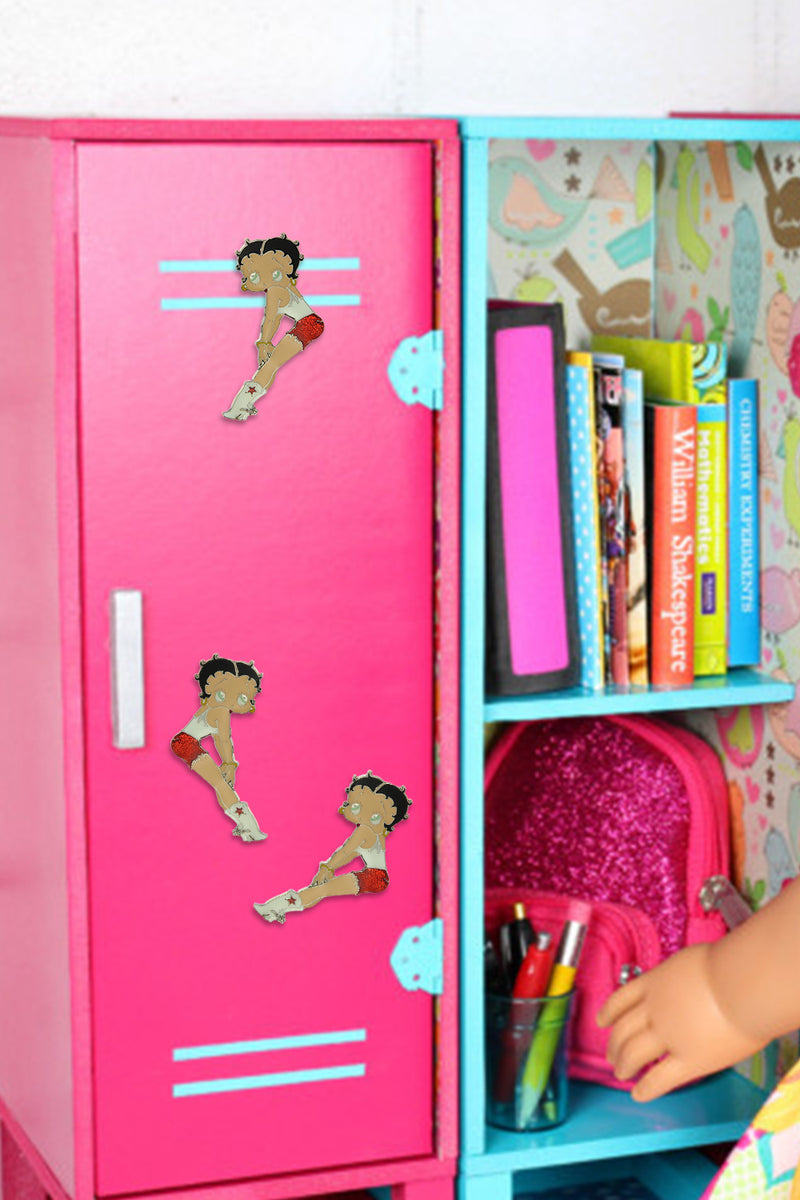 Betty Boop Fridge Magnet Cutie Betty is wearing a red shorts and a white tee and white boots and posing. This fridge magnet sticks easily to the fridge or any other magnetic surface where magnets can stick to. Exclusively Available at Reliance Gifts www.reliancegifts.co.uk 