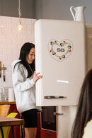 Betty Boop Fridge Magnet Cutie Betty is wearing a red shorts and a white tee and white boots and posing. This fridge magnet sticks easily to the fridge or any other magnetic surface where magnets can stick to. Exclusively Available at Reliance Gifts www.reliancegifts.co.uk 