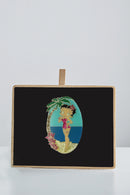 Betty Boop Fridge Magnet Paradise Betty is posing in a pink dress with a blue background. This fridge magnet sticks easily to the fridge or any other magnetic surface where magnets can stick to. Betty Boop Paradise fridge magnet has a fine quality craftsmanship. Exclusively Available at Reliance Gifts www.reliancegifts.co.uk 