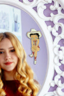 Betty Boop Fridge Magnet Cowgirl Betty is in a pink dress and posing with a guitar.This fridge magnet sticks easily to the fridge or any other magnetic surface where magnets can stick to. Betty Boop Cowgirl fridge magnet has a fine quality craftsmanship. Exclusively Available at Reliance Gifts www.reliancegifts.co.uk