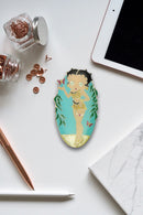 Betty Boop Fridge Magnet Jungle Queen Betty is wearing a golden animal print dress posing with butterflies. This fridge magnet sticks easily to the fridge or any other magnetic surface where magnets can stick to. Exclusively Available at Reliance Gifts www.reliancegifts.co.uk