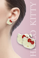 Hello Kitty Earrings An elegant white enamel coated Hello kitty face with a red bow and a little yellow nose made from 925 Sterling Silver Range. The workmanship is fine with attention been paid to all the minute detailing. Exclusively Available at Reliance Gifts www.reliancegifts.co.uk