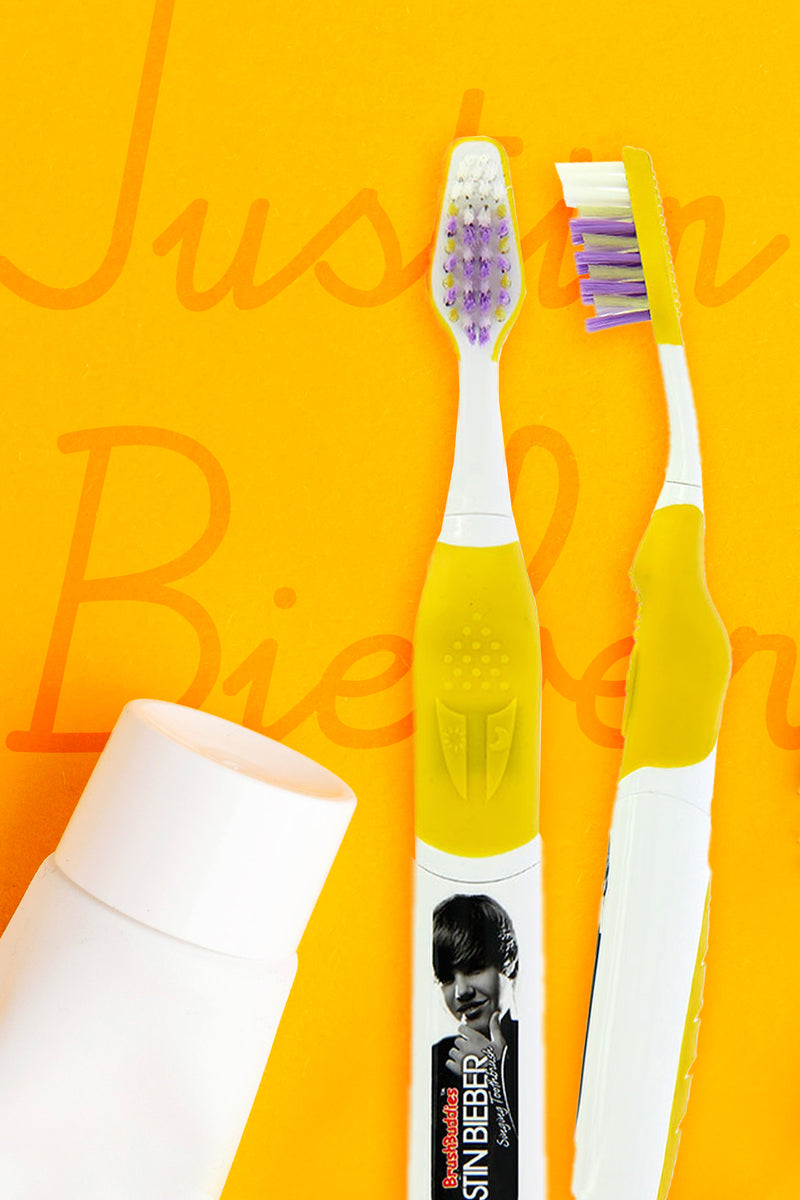 Justin Bieber Singing Toothbrush (Somebody to Love and Love me)-Yellow Justin Bieber Singing Toothbrush features the hits "Somebody to Love" and "Love me" by Justin Bieber. It’s available in 4 colours Red, Yellow, Purple and Blue colour perfect for both boys and girls.