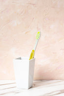 Justin Bieber Manual Toothbrush-Yellow Join the brushing revolution by getting your Justin Bieber toothbrush today. The unique stand-up design brush head will not touch the counter, keep hygiene and help children to clean their teeth more effectively. It will prevent tooth decay and oral problems.