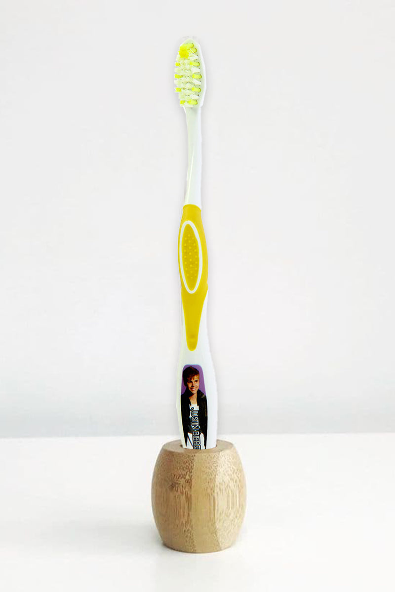 Justin Bieber Manual Toothbrush-Yellow Join the brushing revolution by getting your Justin Bieber toothbrush today. The unique stand-up design brush head will not touch the counter, keep hygiene and help children to clean their teeth more effectively. It will prevent tooth decay and oral problems.