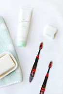 Justin Bieber Sonic Toothbrush -Red looks great with a cute picture of Justin Bieber on the handle looking back at you. Easily Replaceable Brush Head includes a tongue and cheek cleaner. 2 buttons = on and off on the brush handle. It has a replaceable AAA battery is included and easy to replace.